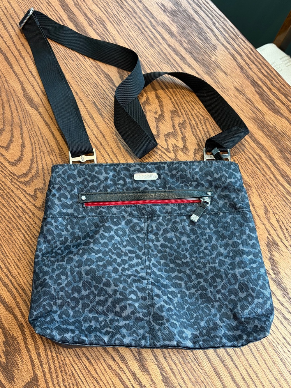 Baggallini Black Charcoal Leopard Crossbody with Red Zip Accent